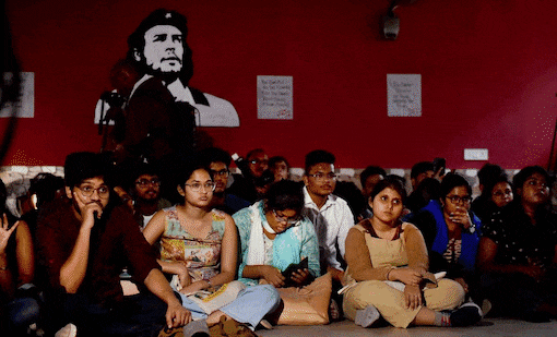 Members of Students' Federation of India watch BBC documentary in Kolkata', while police detain Bhim Army Student Federation members for planning to screen film on Modi. (PTI)